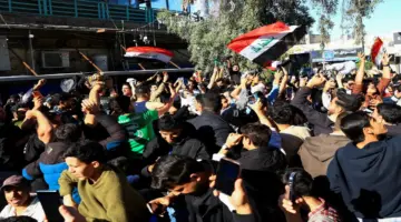 شاهد.. الاحتفالات تملأ الشوارع وعطلة رسمية بالعراق بعد التأهل للمونديال