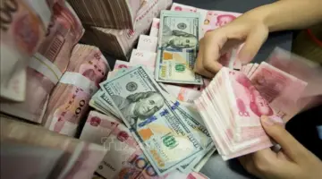 انخفاض طفيف للدولار الأمريكي، وتعافي اليوان الصيني.